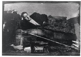 Portrait of Guillaume Apollinaire (1880-1918) reclining, c.1910 (b/w photo) 