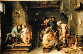 A tavern interior with peasants carousing