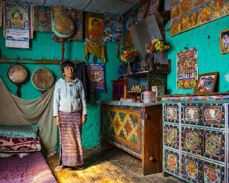 Woman in her living room, Bhutan.