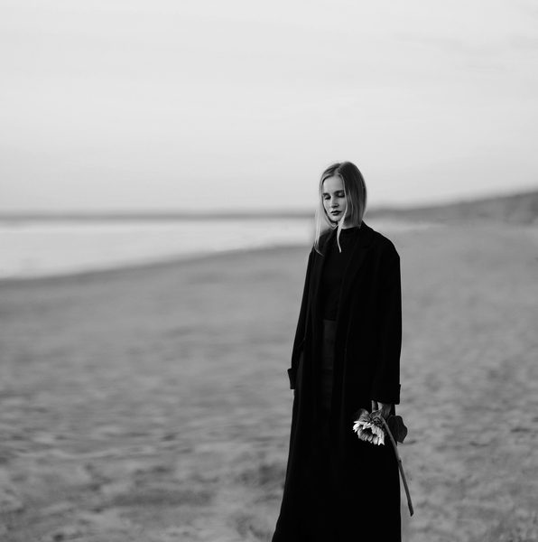 Woman on a beach van Anastassia Volkova