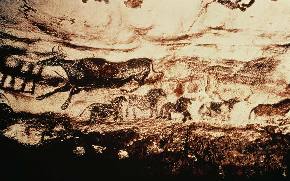 Rock painting of a leaping cow and a frieze of small horses van Anoniem