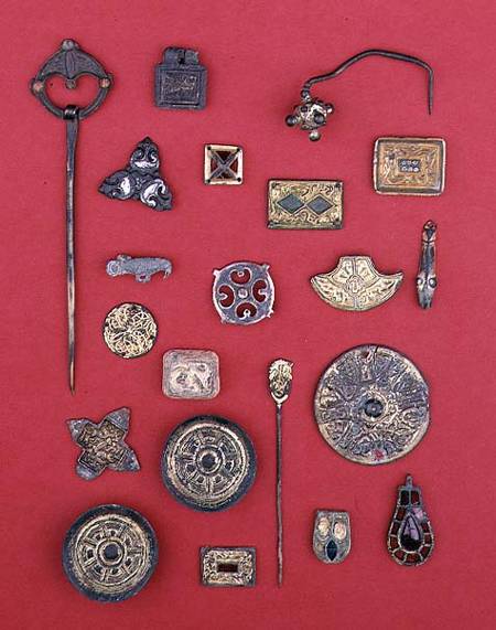 Collection of Anglo-Saxon and Celtic jewellery including gilt bronze mountssaucer and cruciform broo van Anoniem