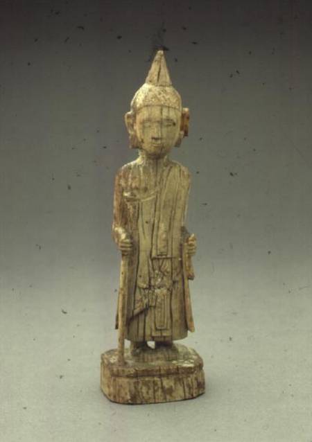 Ivory figure of the Penitent Buddha, walking and holding a staff,Burmese van Anoniem