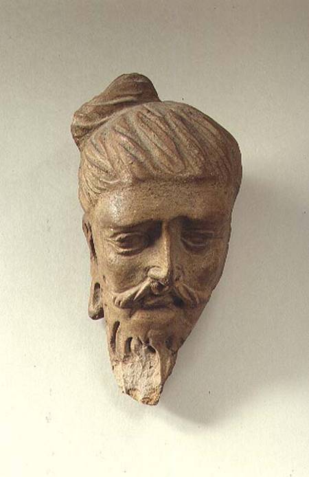 Terracotta head of a sageKashmir van Anoniem