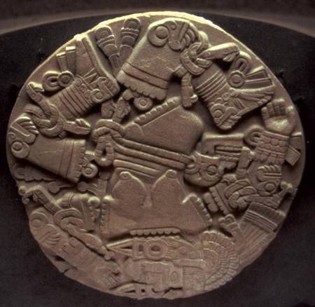 Carving of the dismemberment of the moon goddess Coyolxauhqui, found at the foot of the twin pyramid van Aztec