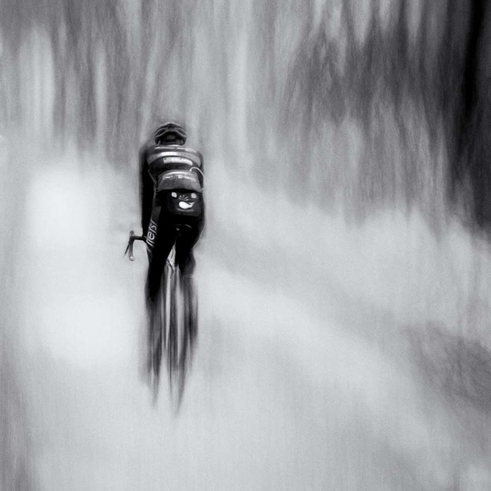 Lone Cyclist van Bruno Flour
