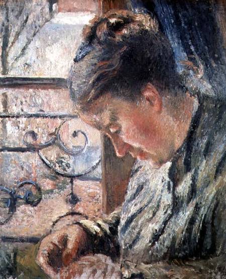 Portrait of Madame Pissarro Sewing van Camille Pissarro