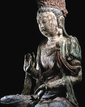 Large seated bodhisattva with hands raised