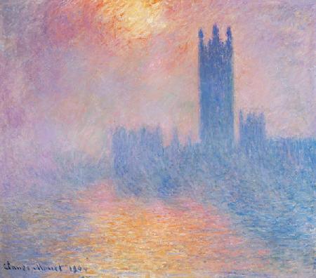 The Houses of Parliament, London. Parlementhuis londen met de zon door de mist