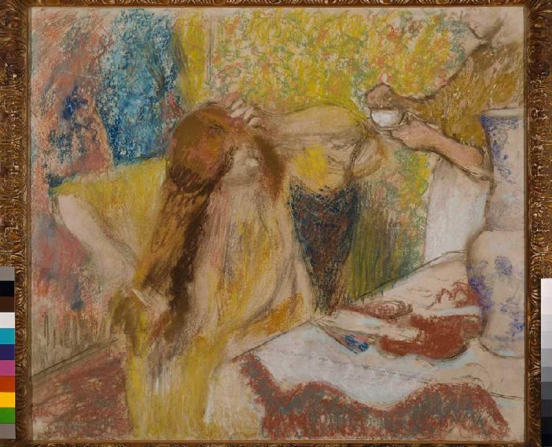 Sich kämmende Frau und Hausmädchen van Edgar Degas