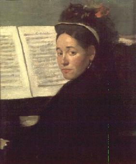 Mademoiselle Marie Dihau (1843-1935) at the piano