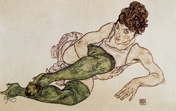 Reclining woman, green tights van Egon Schiele