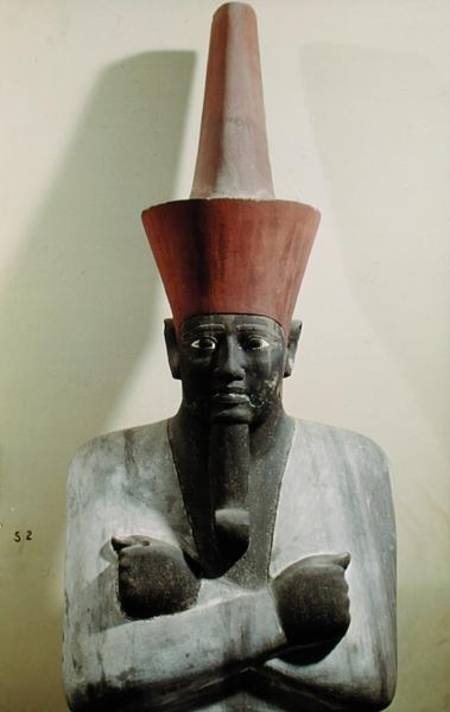 Detail of a statue of Mentuhotep II, enthroned and wearing the red crown of Lower Egypt, taken from van Egyptian