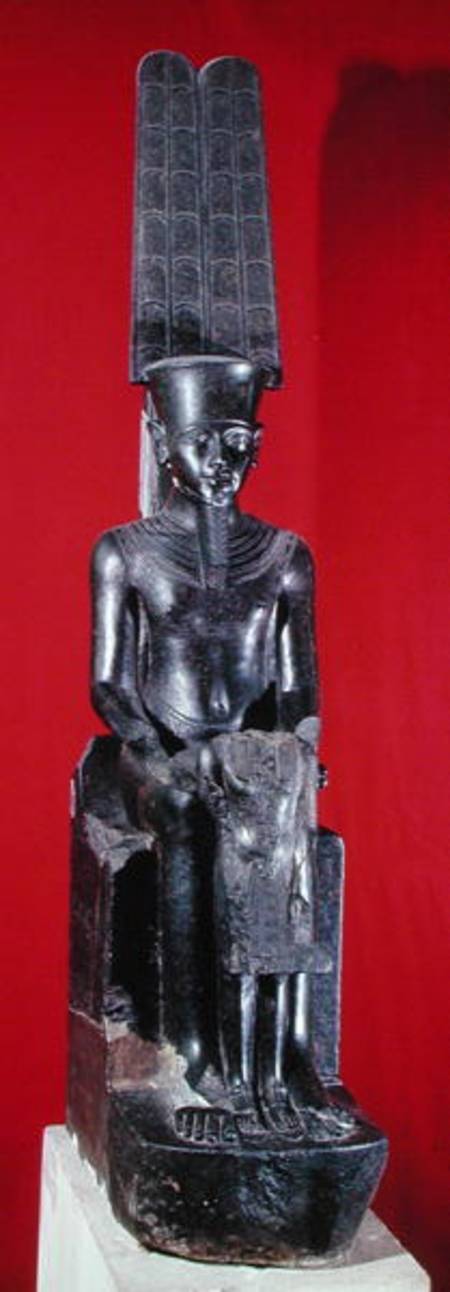 Seated statue of the god Amon protecting Tutankhamun, New Kingdom van Egyptian