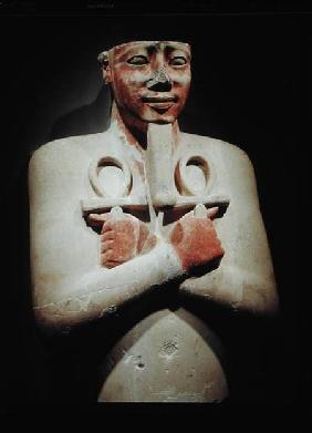 Statue of Sesostris I (c.1918-1875 BC) holding the ankh in both hands crossed over his chest, from t
