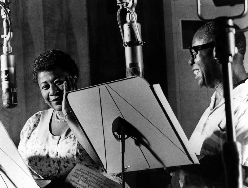 Ella Fitzgerald American jazz Singer with Louis Armstrong jazz trumpet player and Singer during a re van English Photographer, (20th century)