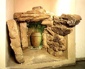 Reconstruction of an Etruscan tomb with an urn (stone)