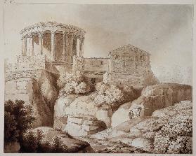 Der sogenannte Sibyllentempel zu Tivoli, der Tempel steht von Gebäuden umgeben über baumbestandenen 