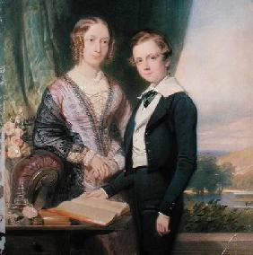 Portrait of an unknown young man standing by his mother