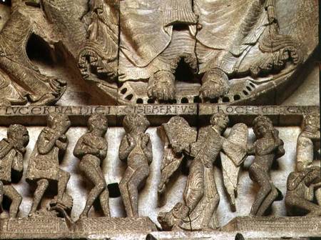 West Portal tympanum depicting the Last Judgement: detail of Christ's feet, an angel and mortals van Gislebertus