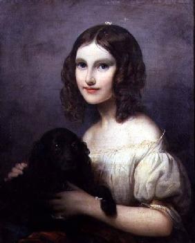 Portrait of a young girl with her pet dog