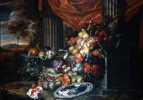 Still life of fruit in a landscape setting