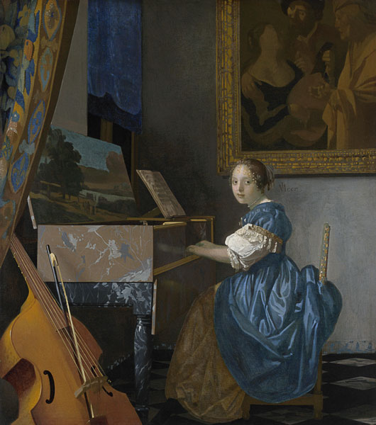 Zittende jonge dame van Johannes Vermeer 