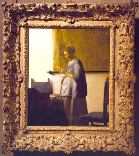 Woman Reading a Letter van Johannes Vermeer 