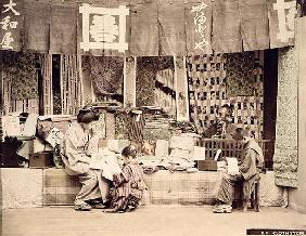 A Japanese cloth store, c.1890 (hand coloured photo)