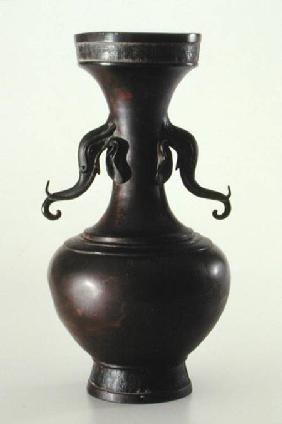 Vase with elephant head handles