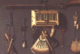 A Trompe l'Oeil Still life of a Gun, a Powder Horn, a Caged Bird and Hunting Equipment
