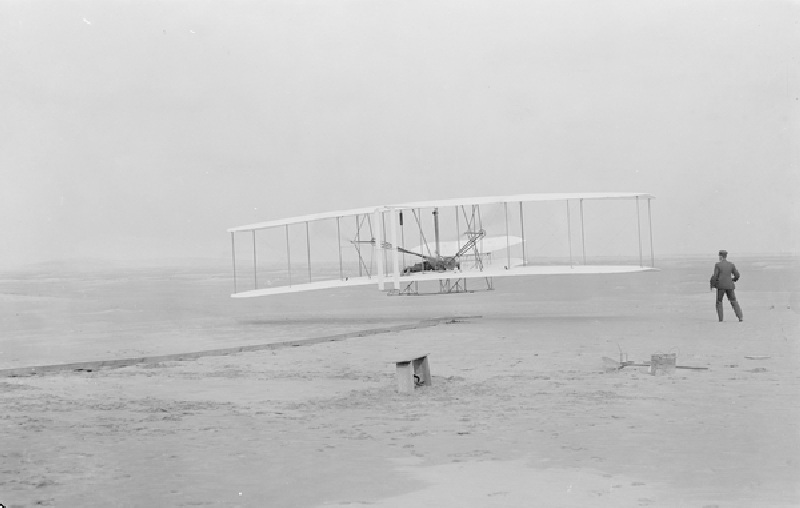 First flight, Kitty Hawk, North Carolina, 120 feet in 12 seconds, 10.35am December 17th 1903 (b/w ph van John T. Daniels