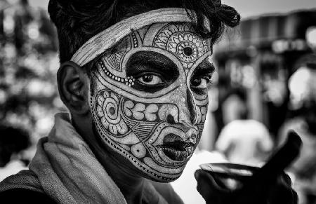 Theyyam Ceremony Performer drinking some water - Kannur- India&quot;
