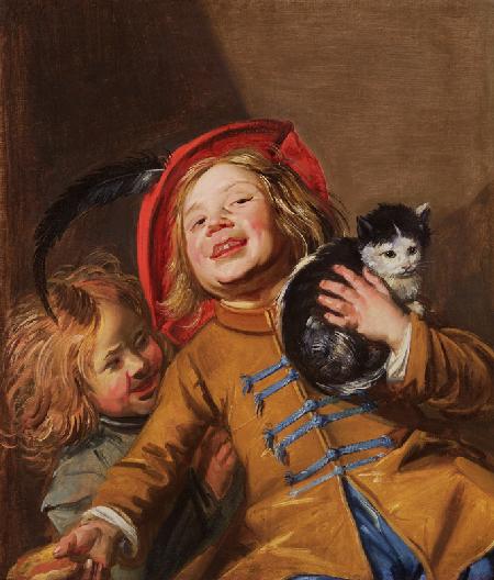 Lachende kinderen met een kat