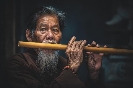 Playing Flute in northern Vietnam