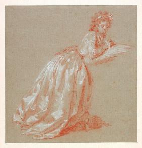 Young woman kneeling