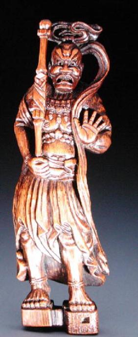 Netsuke depicting a temple guardian sculpture
