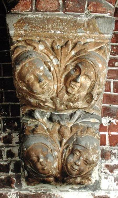 Carved capital depicting four faces, from the south portal van Netherlandish School