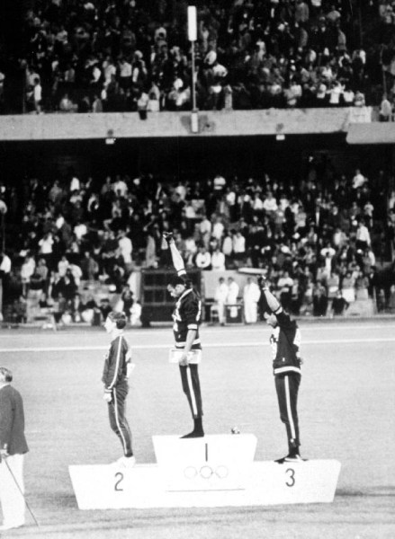 1968 Olympic Games. Mexiko City. Mens 200 m. TOMMIE SMITH, USA, Gold, and J. CARLOS, Bronze, in Blac van 