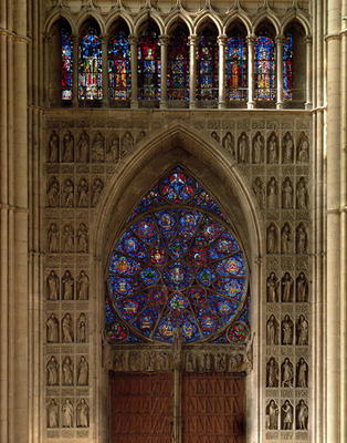 View looking west from the nave, rose window designed by Bernard de Soissons, with surrounding statu van 