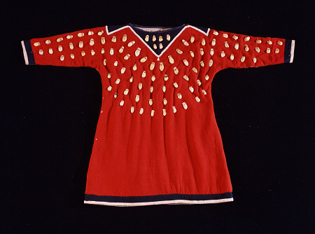 A Crow Cloth Child''s Dress In Red Wool Decorated With Elk Teeth van 