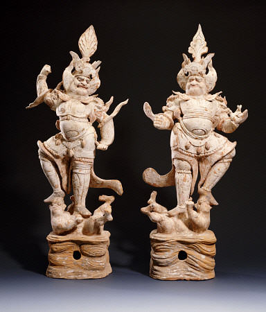 A Fine Pair Of Painted Pottery Lokapala Guardians Standing On The Head And Belly Of A Recumbent Demo van 