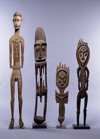 A Group Of Melanesian Figures Including An Asmat And Southern Abelam Male Figures And Karawari Cave van 