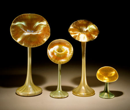 A Group Of Quezal Iridized Glass `Lily'' Vases van 