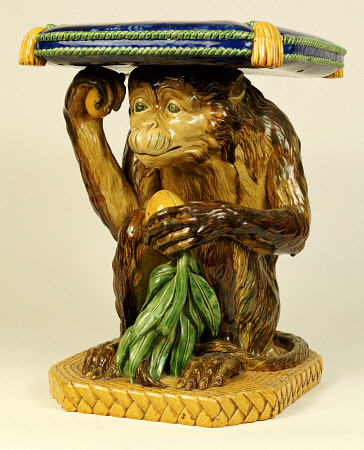 A Minton ''Majolica'' Garden Seat Modelled As A Crouching Monkey Supporting A Cushion On His Head, C van 