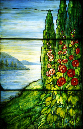 A Mountainous Lake Scene With Red Blossoming Hollyhocks And Arbor Vitae Painted And Leaded Glass Lan van 
