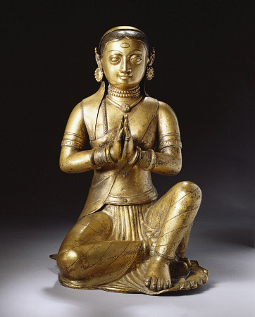 A Nepalese Embossed Gilt-Copper Figure Of A Worshipping Queen, Early 18th Century van 