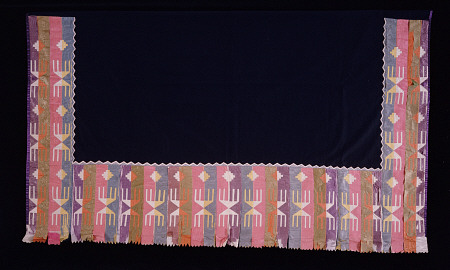An Osage Woman''s Shawl, Of Blue Trade Cloth, Decorated On Three Sides Of The Border With Ribbon App van 