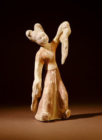 A Painted Pottery Figure Of A Dancer van 