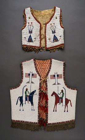 A Plains Beaded Hide Child''s Vest And A Sioux Pictoral Beaded Vest van 